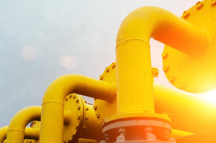 A series of three yellow pipelines (Credit: MVelishchuk/Shutterstock.com)